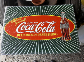Coca-Cola skylt