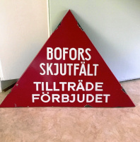 Gammal emaljskylt