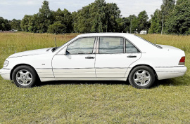 MB 600 SEL V 12 409 hk